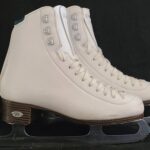 White Riedell Emerald Ice Skates, size 4, with Luna Blade