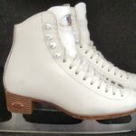 White Model 17 Riedell Ice Skates in very good condition with stainless steel blade